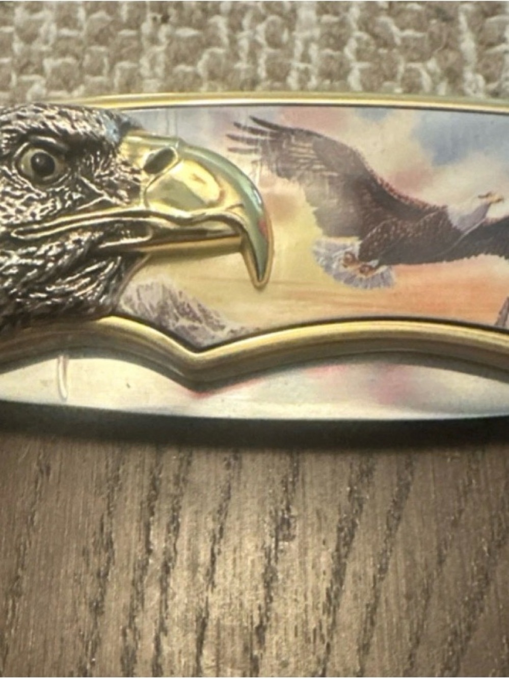 Franklin Mint "Integrity" collectible folding knife with eagle motif.